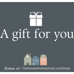 The Honest Homeschool gift card with a dark grey background, white lettering "a gift for you" and the honest homeschool green, blue, and peach color logo.